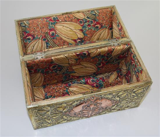 An Arts and Crafts embossed brass and copper casket, circa 1900, length 30cm, height 28cm